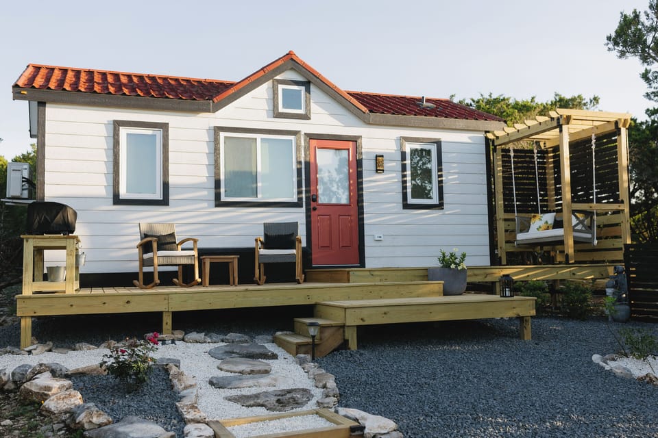 Sip your morning coffee in a comfortable rocking chair or on the couples' swing.