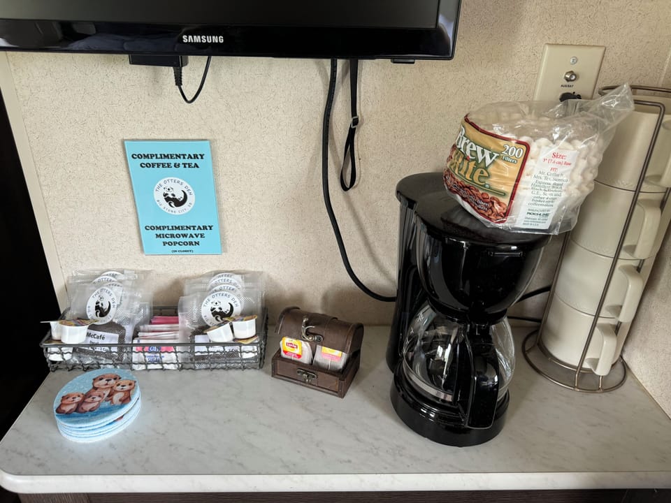 Coffee bar - McCafe- decaf and regular, and Lipton Tea.  Sugar,sweetner,cream
