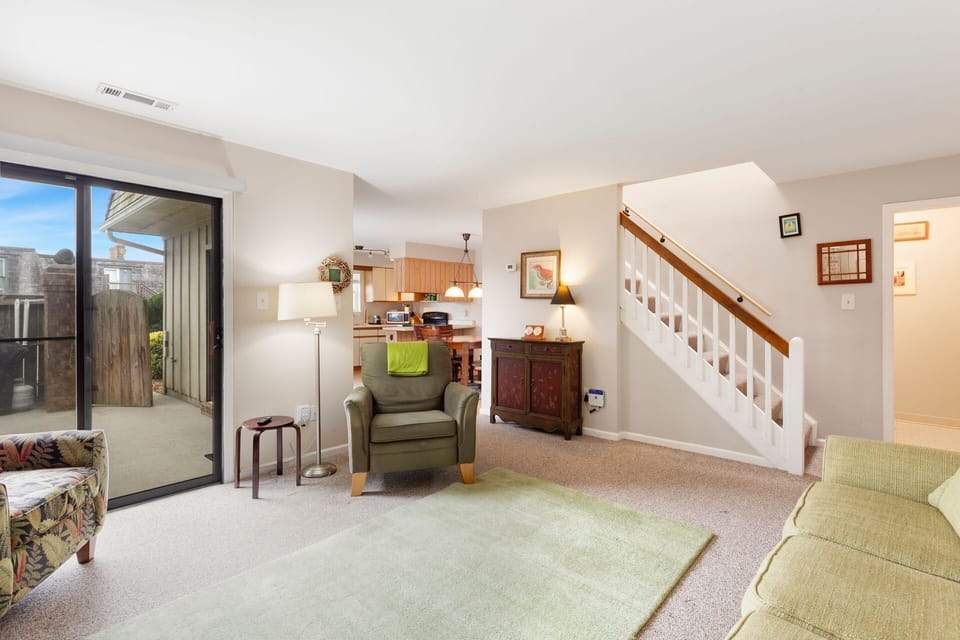 Relax in the spacious Living Area with a Flat Screen TV and plenty of cozy furniture.