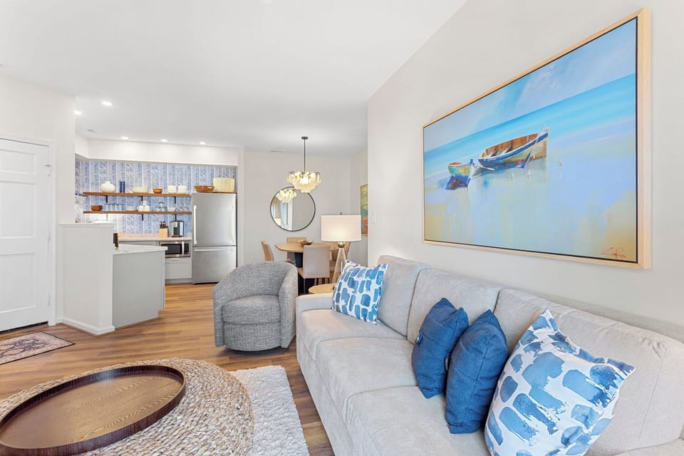 Relax in the spacious Living Area with a Flat Screen TV and lots of natural light.