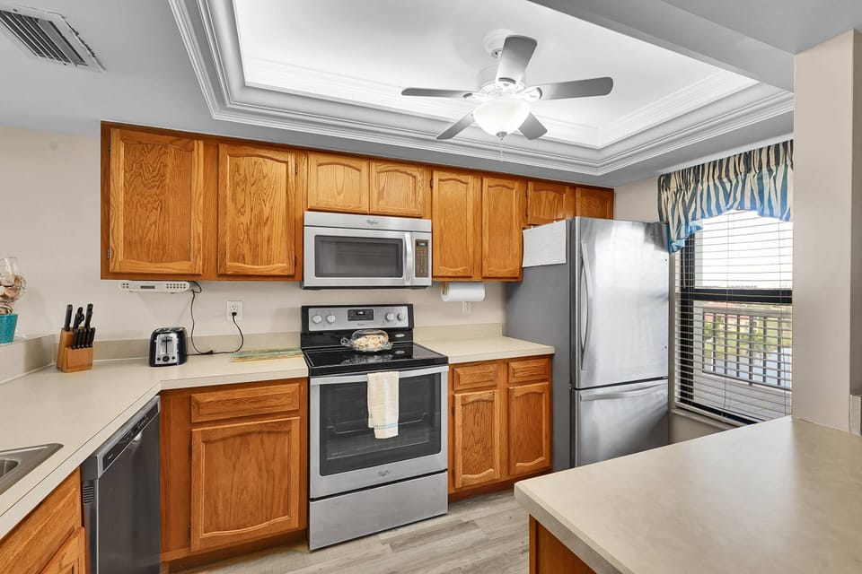 Cookware, dinnerware, many kitchen tools and small appliances are provided, including a Keurig coffee maker.