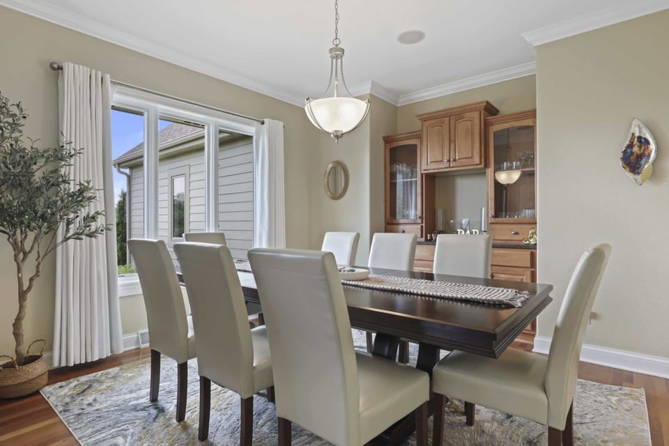 Formal dining room comfortably seats 8.