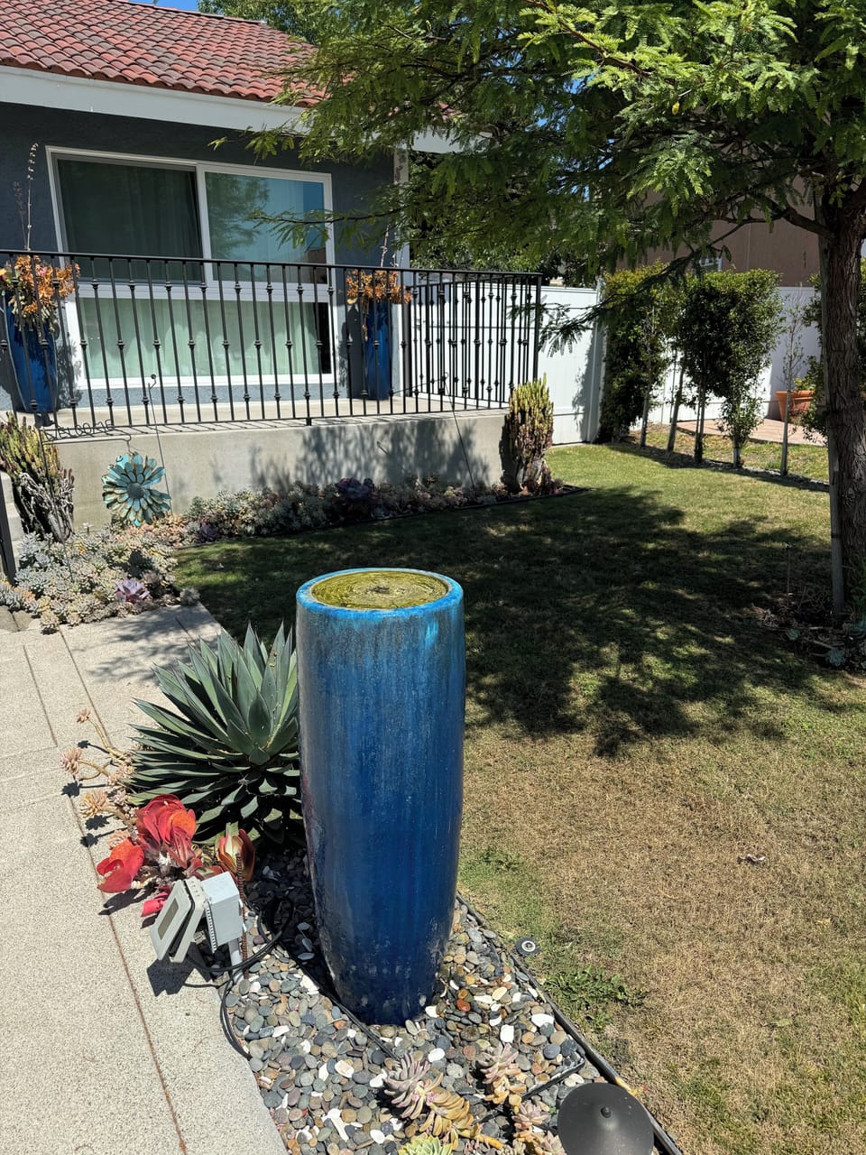 Front yard with bubbling fountain