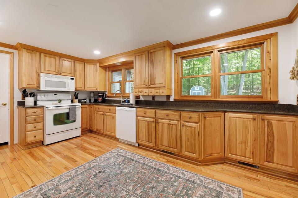 Our well-appointed kitchen has everything you need to make even the grandest of meals. Look at all that counter space!