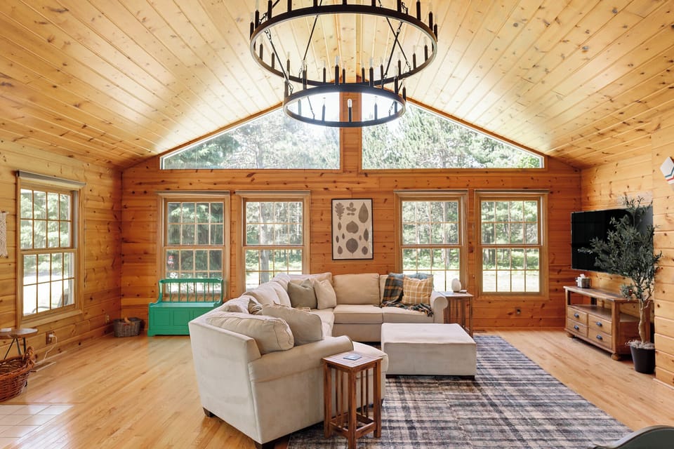 The natural light abounds through our open floor plan. Our spacious living room with vaulted ceilings are a showstopper!