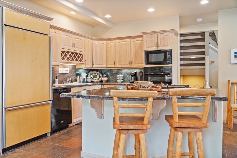 Kitchen: Drip coffee maker, Keurig, Crockpot, cooking utensils, tableware