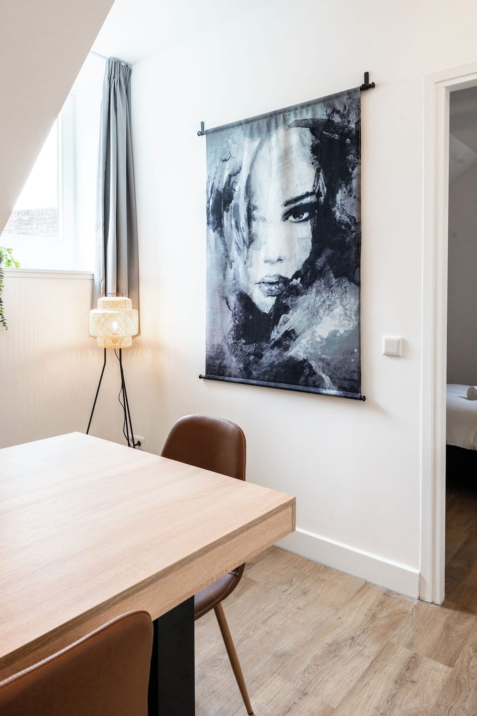 Dining area with sophisticated art.