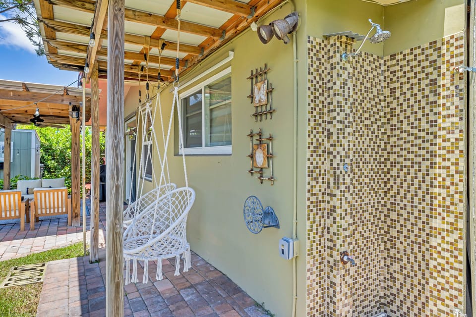 Outdoor shower makes rinsing sandy feet easy.