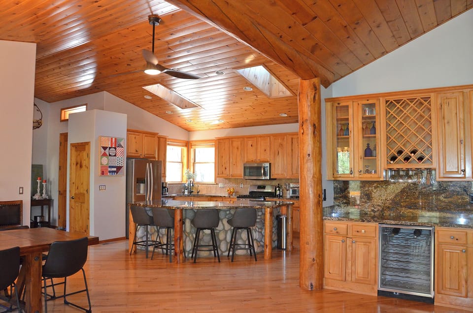 kitchen and bar view from sofa [dining table on left]