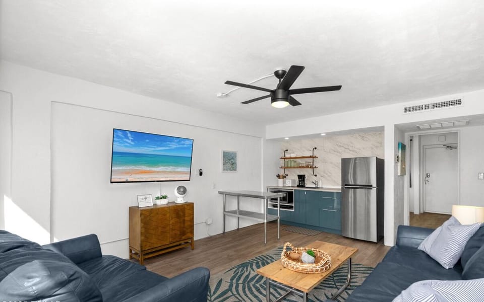 Comfortable couches and Smart TV w Cable for relaxing at the end of a beach day!