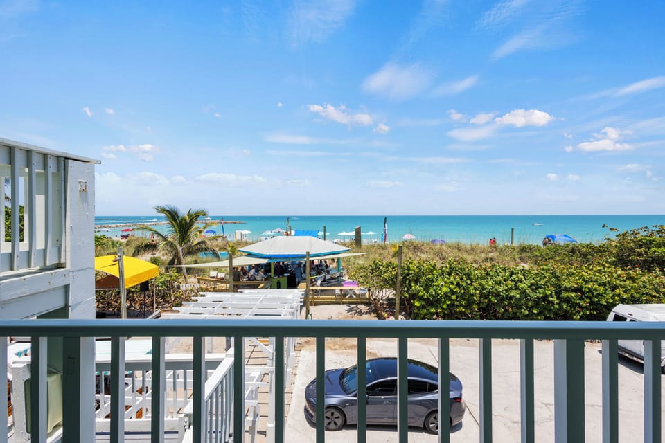 The view from the room overlooks the ocean, beach, and peaks of the Fort Pierce Inlet.