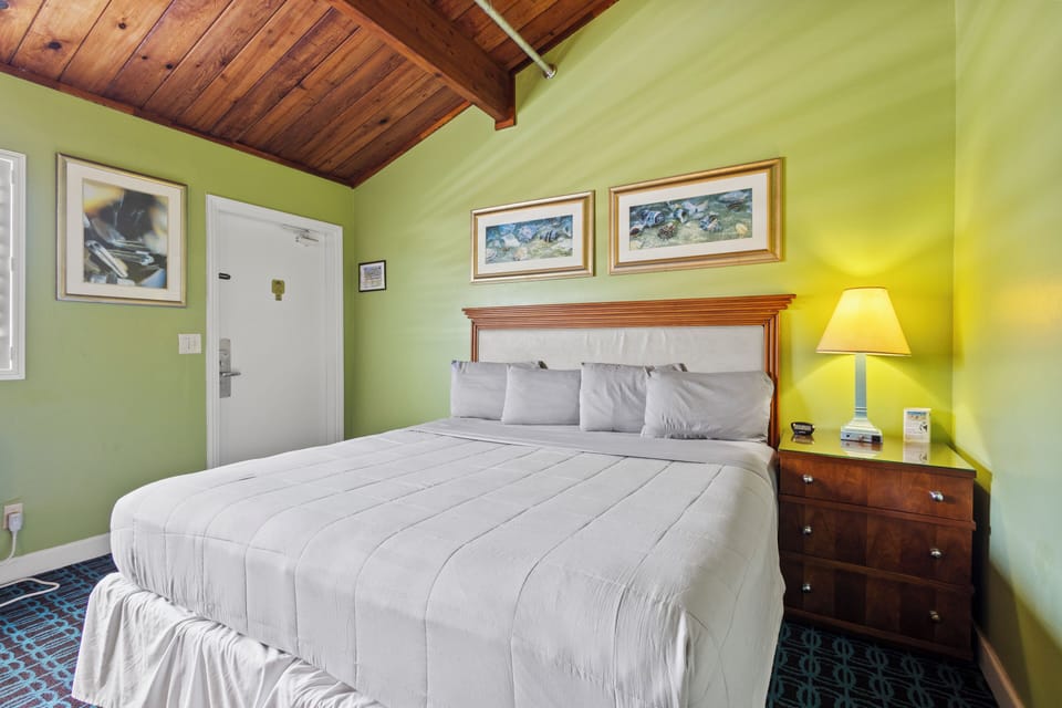 Comfortable rustic charm with vaulted wood ceilings and coastal colors and decor.