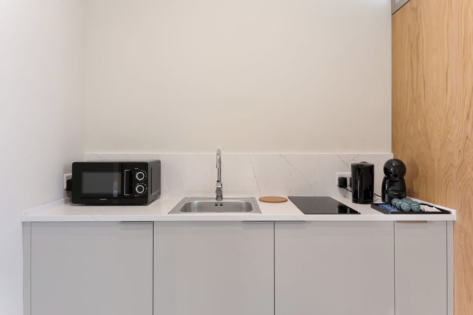 Private kitchen with built-in fridge & freezer, microwave, electric stove