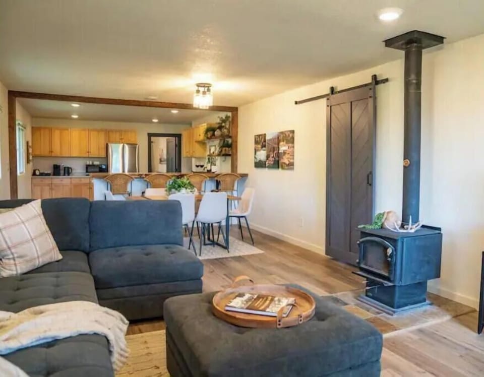 Open living, dining and kitchen area.