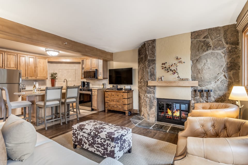 Living room with wood-burning fireplace
