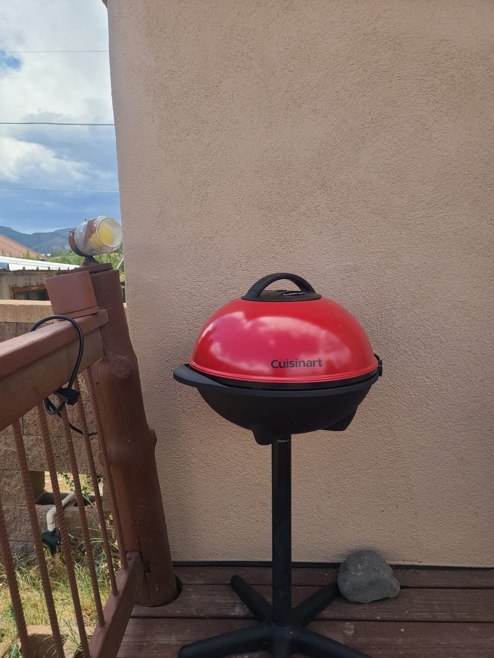 Cuisinart electric grill for outdoor cooking with fire safety in mind.
