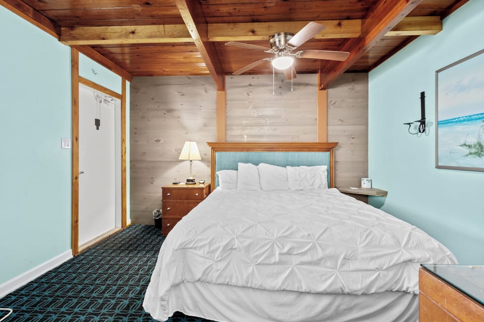 Amenities include a smart TV with cable, a mini fridge, a microwave, and a coffee maker.