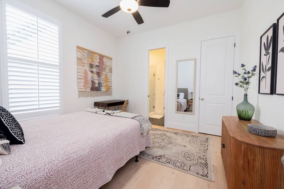 Queen bedroom with ensuite bathroom on main level