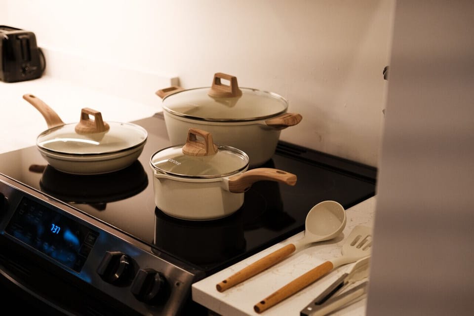 The fully stocked kitchen comes with brand new pots and pans, utensils, cutting boards, knives and everything else you need to cook your favorite meals.