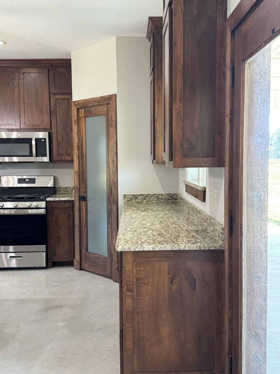 Spacious countertops in the kitchen.  Beautiful granite.