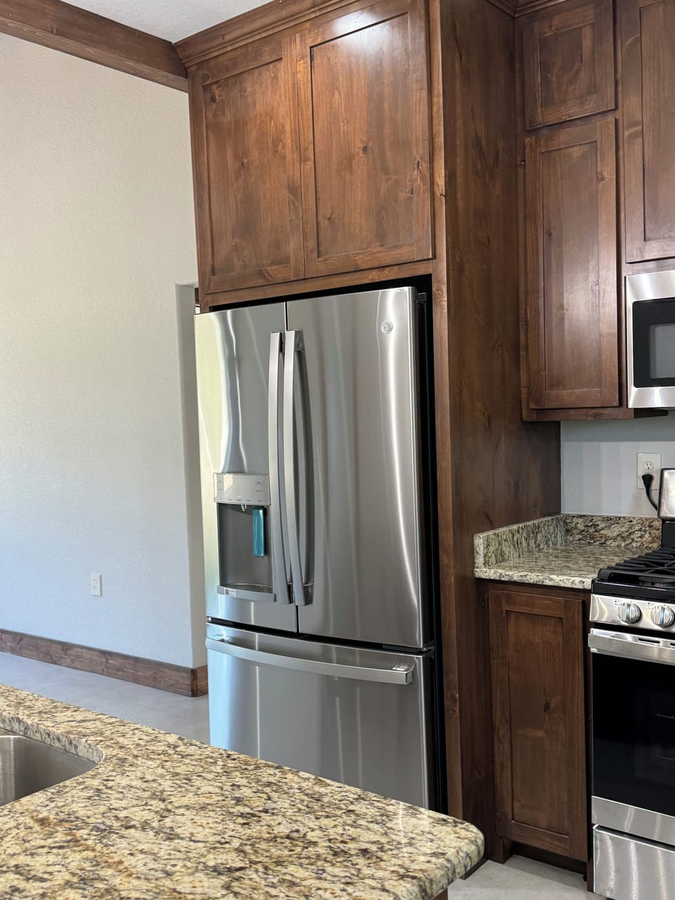 Kitchen, fridge.  Water ice in the door.