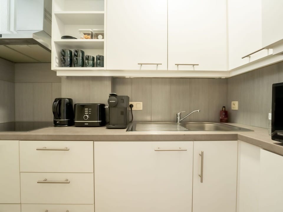 Cabinetry, Countertop, Kitchen Sink, Property, Sink, White, Kitchen Appliance, Kitchen, Kitchen Stove, Home Appliance