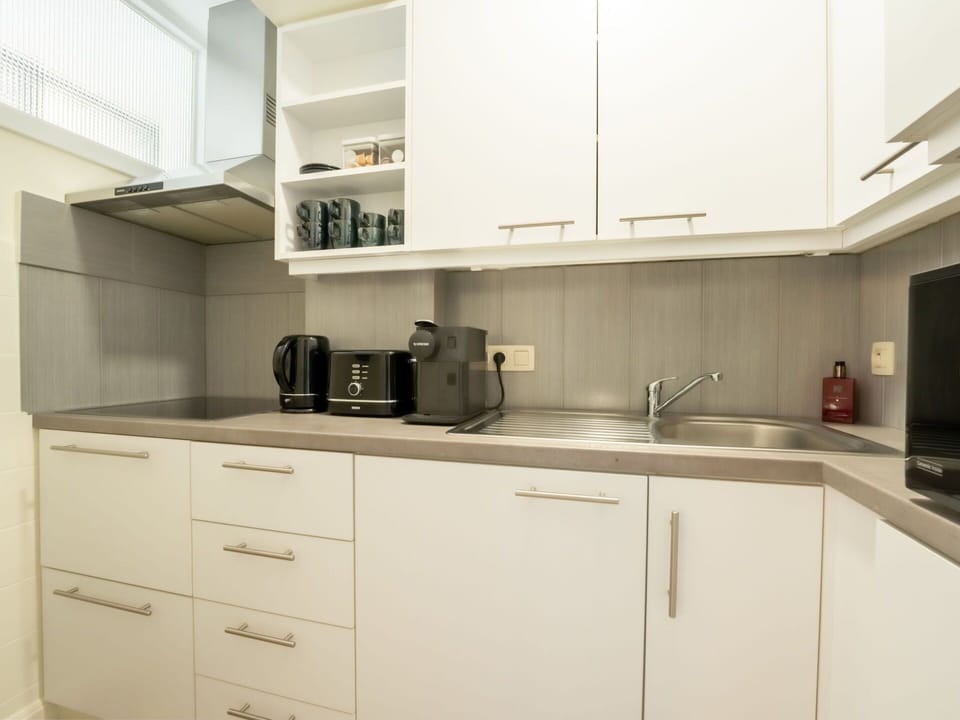 Cabinetry, Kitchen Sink, Property, Countertop, Sink, Kitchen, Kitchen Appliance, Home Appliance, Kitchen Stove, Interior Design