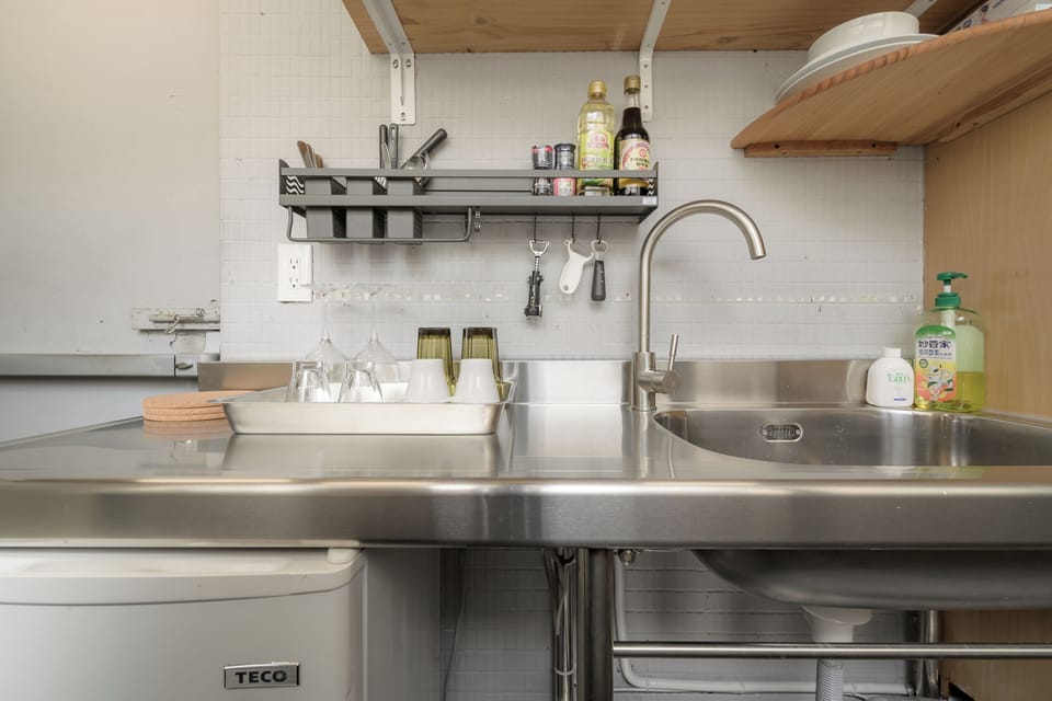 Kitchenette: 
• Microwave 
• Toaster Oven 
• Kettle 
• Fridge 
• Dinnerware 
