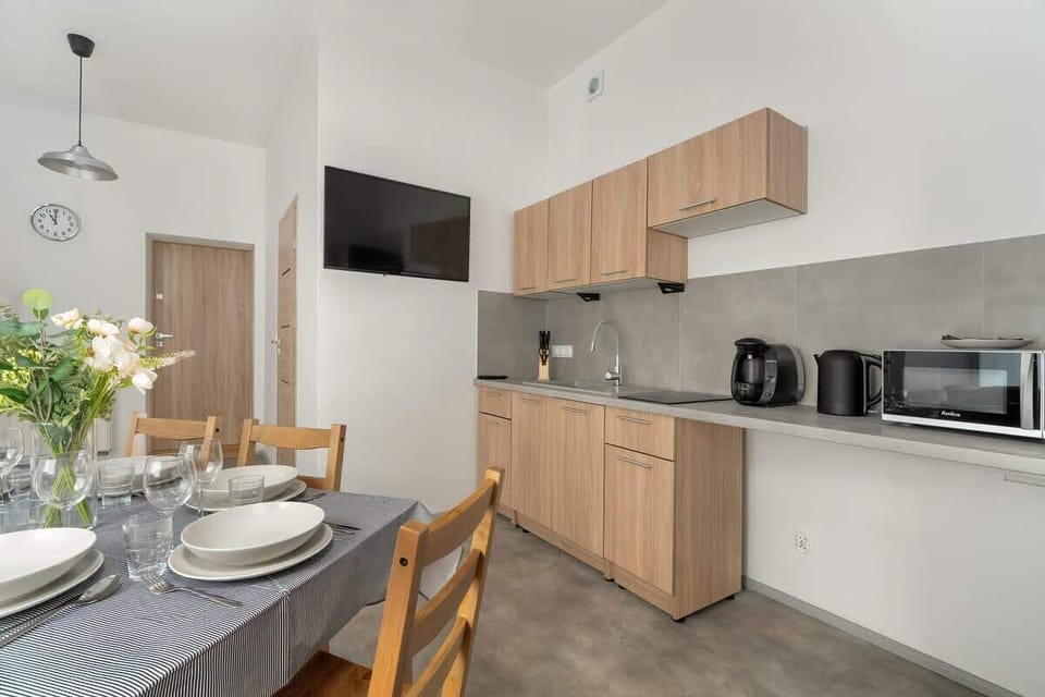Kitchenette with a microwave.
