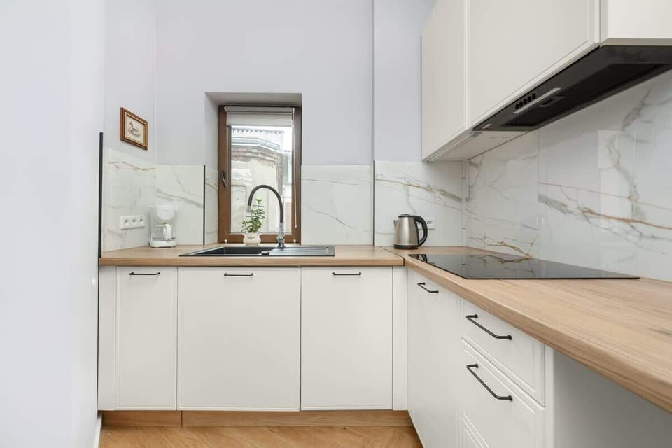 Kitchen with coffee maker.