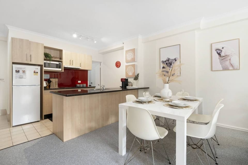 Modern kitchen and dining space, designed to feel both practical and welcoming.
