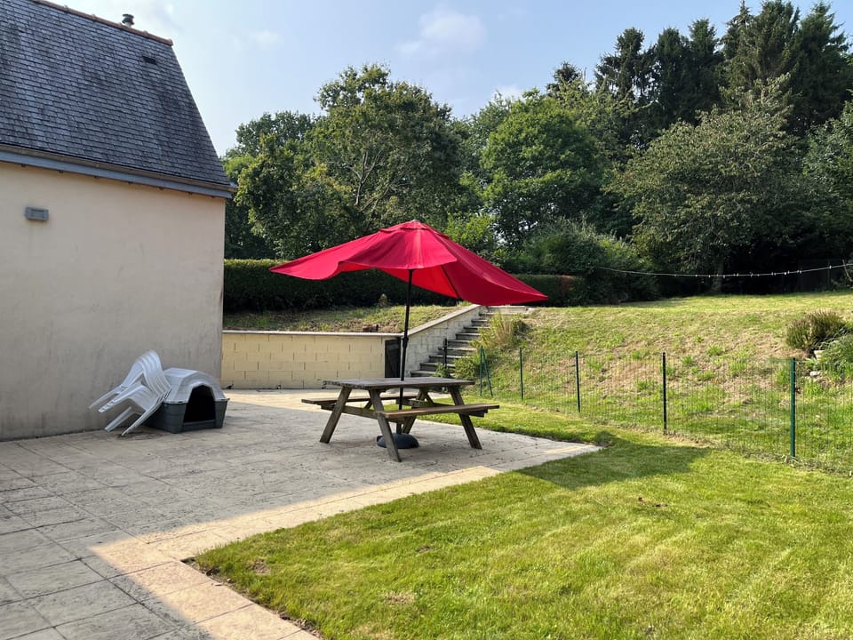 Private enclosed patio, plus further private garden up the slope (not enclosed)