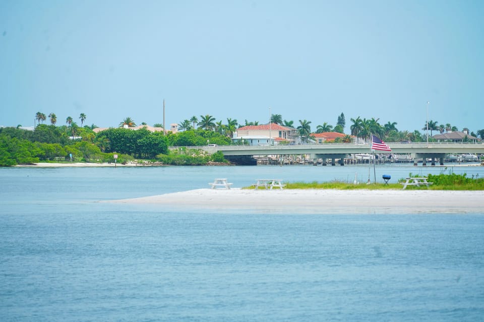 The secluded island off the dock beckons guest to test their paddle board skills.