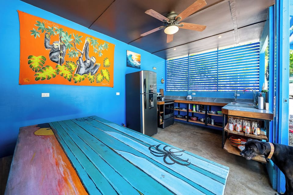 Open air kitchen, fully stocked, stainless steel pots, sharp knives, hot H2O.
