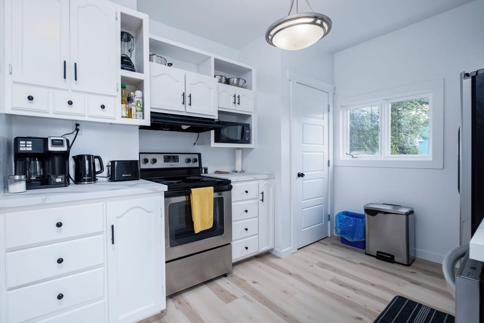 Cozy and efficient kitchen designed for convenience and ease during your stay.