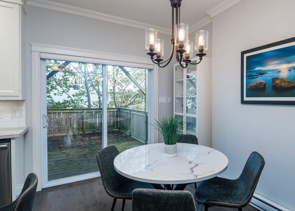 Dedicated dining space just off the kitchen, ideal for both casual breakfasts and formal dinners.