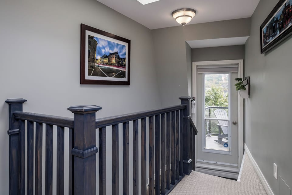 Backing onto the master bedroom on the top level. The door ahead, leads to a private patio with 2 chairs, table, and incredible views.