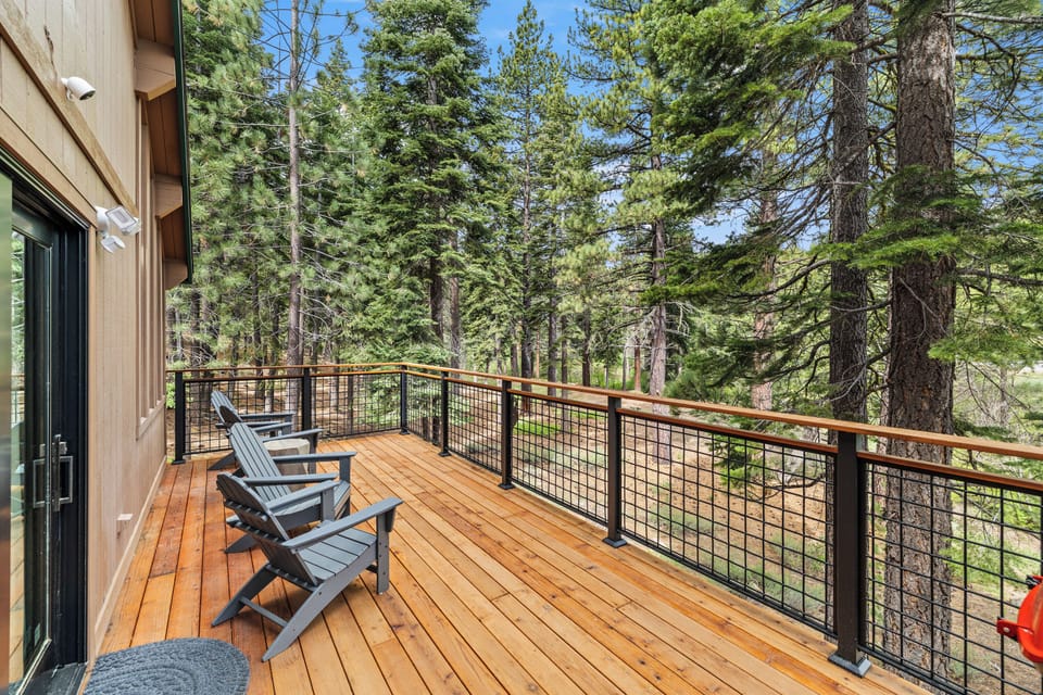 Large new deck with a gas BBQ and outdoor furniture