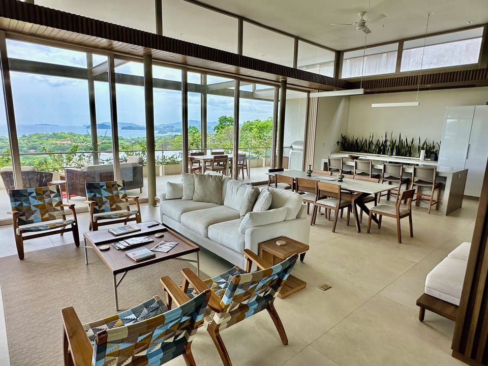 On the main level, the great room has open living/dining/kitchen.