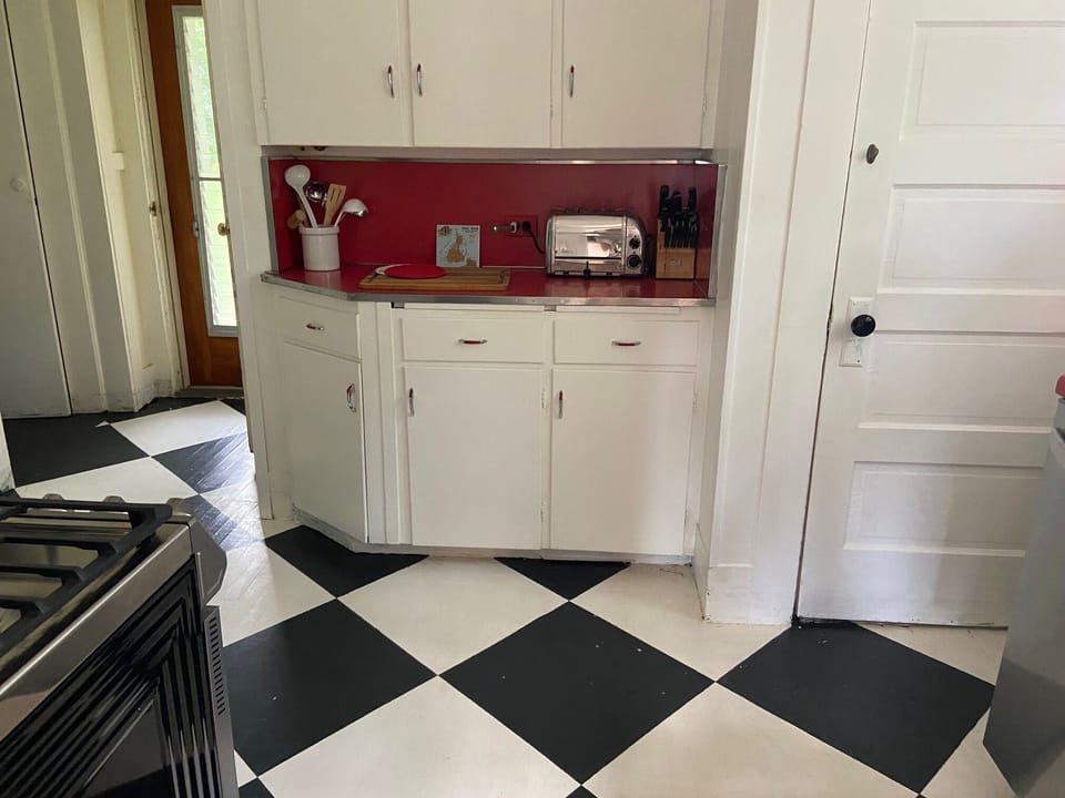 Fun kitchen with Hand painted wood checkered floor!!!