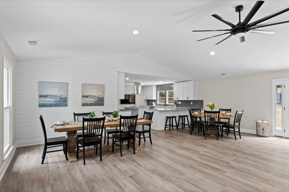 Two dining areas next to the kitchen. 