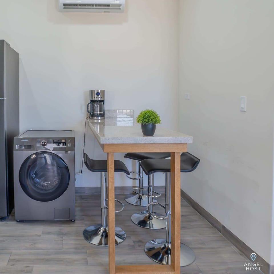 Enjoy the convenience of a washer/dryer combo right in the kitchen.
