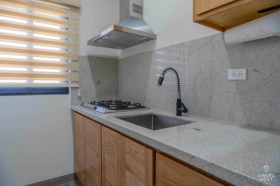 Enjoy the generous counter space, perfect for easy meal prep or setting up for a family dinner.