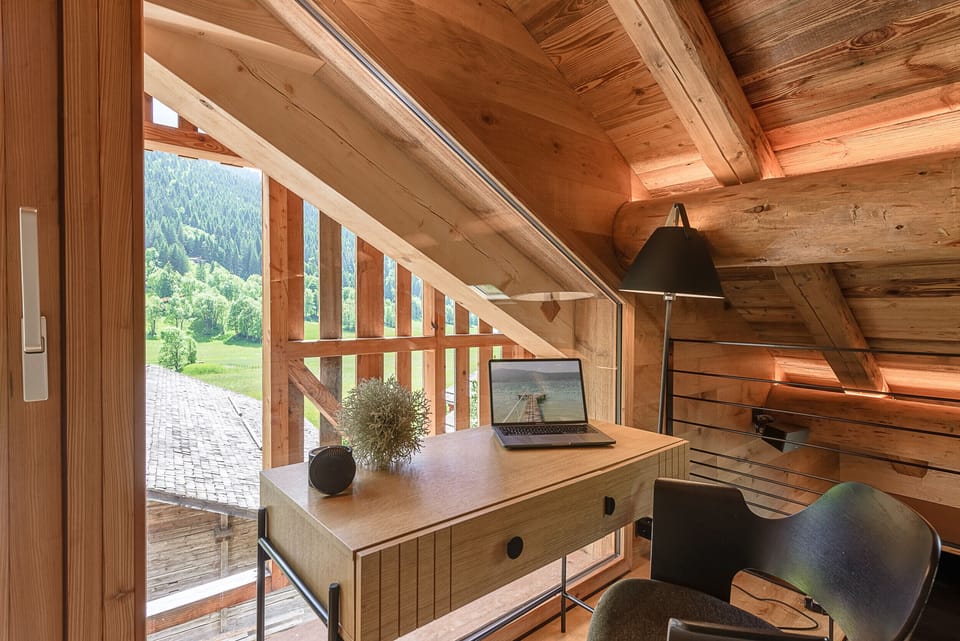Office with panoramic mountain views, level 1 of the chalet