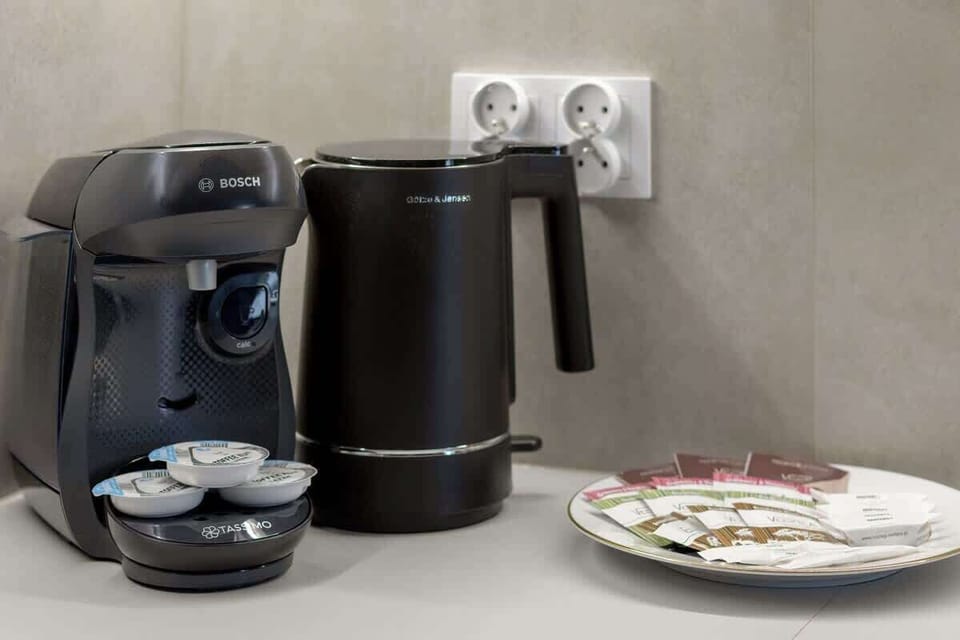 The capsule coffee machine and kettle offer the convenience of your daily coffee or tea ritual.