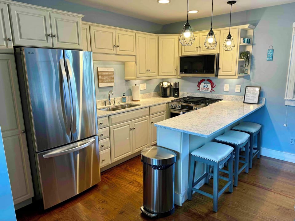 Kitchen with all new stainless steel appliances.