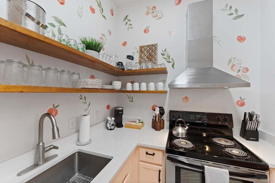A fully equipped kitchen with a pop of personality!