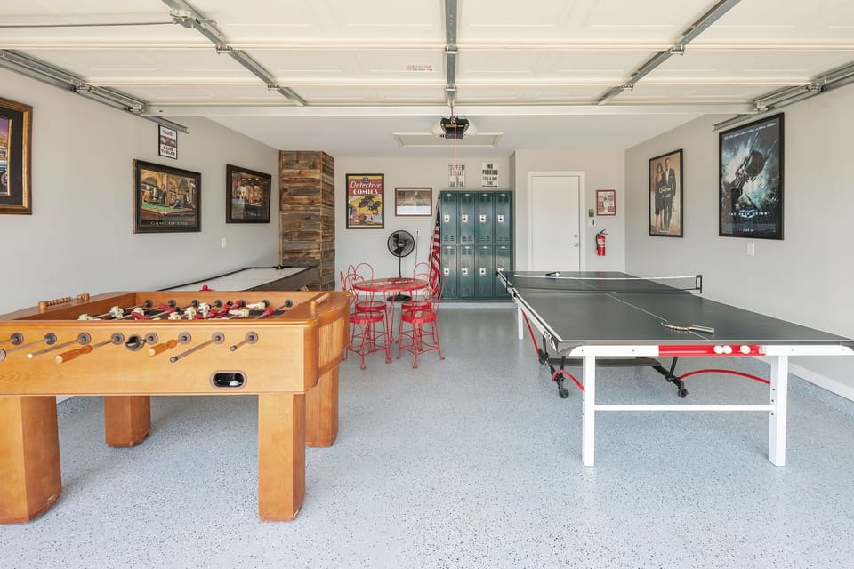 Game Room with foosball, air hockey, and a ping pong table with vintage seating