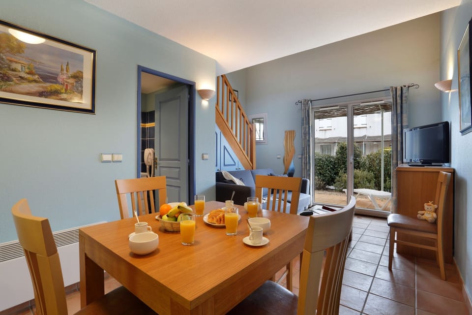 Share meals and laughs at the dining table.