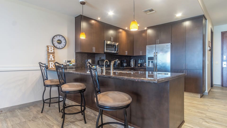 Counter with bar stools in the kitchen